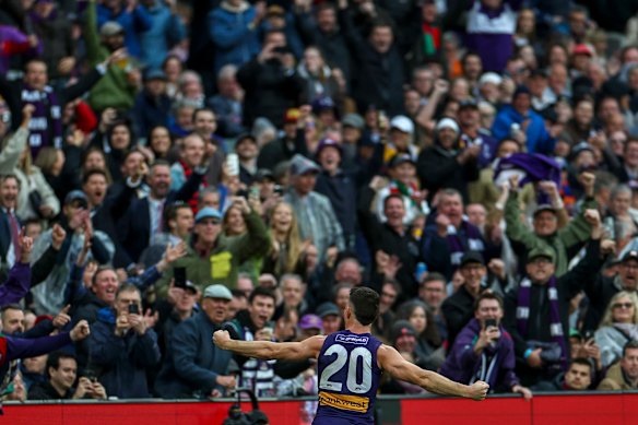 Fremantle fans were ecstatic as they celebrated Voss’ third goal, which they thought had sealed their first flag. 