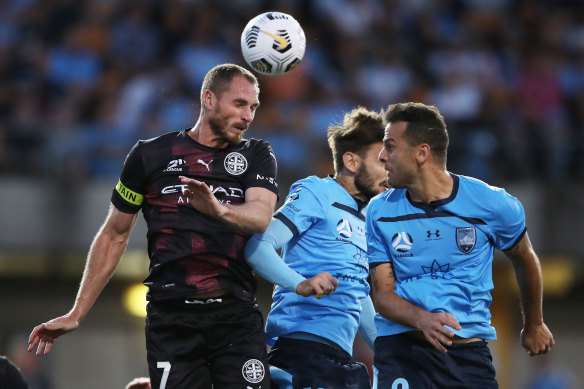 Rostyn Griffiths of Melbourne City takes on the Sky Blues.