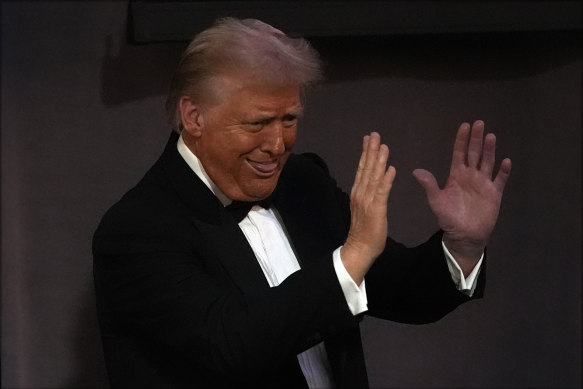 Donald Trump gestures as he departs the 79th annual Alfred E. Smith Memorial Foundation Dinner in New York.