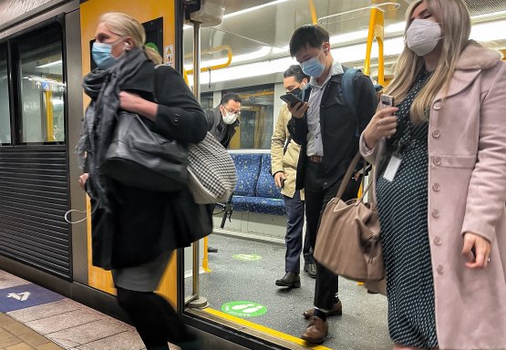 Commuters wore masks at Martin Place Station on Monday morning.