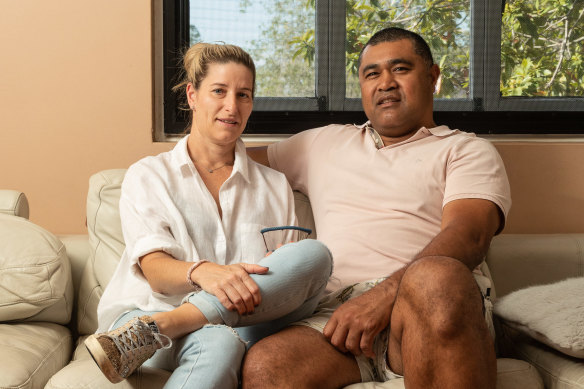 Wallabies legend Toutai Kefu with his wife Rachel at their Brisbane home in October 2021 .