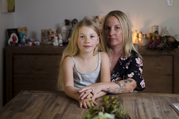 Michelle Underhill and her daughter Elaina, who was seriously injured in a head-on collision that killed her older sister Elle.
