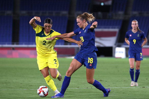 Matildas captain Sam Kerr is challenged by Sweden’s Fridolina Rolfo.