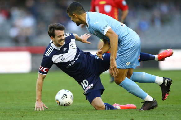 Victory’s Robbie Kruse is challenged during the loss to City.