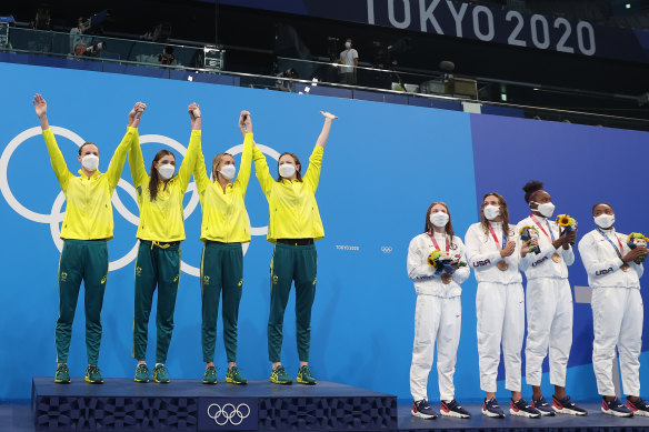 Australian gold medallists Bronte Campbell, Meg Harris, Emma Mckeon and Cate Campbell and American bronze medallists Erika Brown, Abbey Weitzeil, Natalie Hinds and Simone Manuel on the podium after the women’s 4 x 100m freestyle relay final in Tokyo.