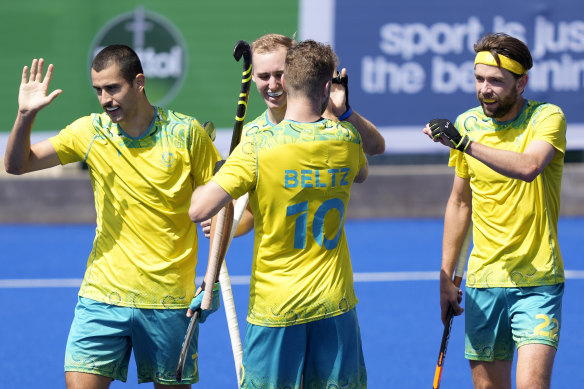 Australia’s Nathan Ephraums, left, celebrates a goal.