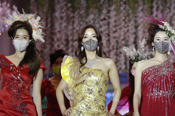 Models wearing face masks during a fashion show amid the coronavirus pandemic in Seoul, South Korea, on Friday.