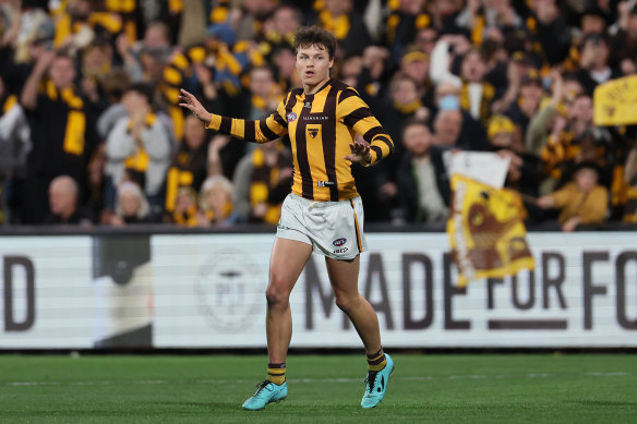 Hawks forward Jack Ginnivan celebrates a goal against Port Adelaide.