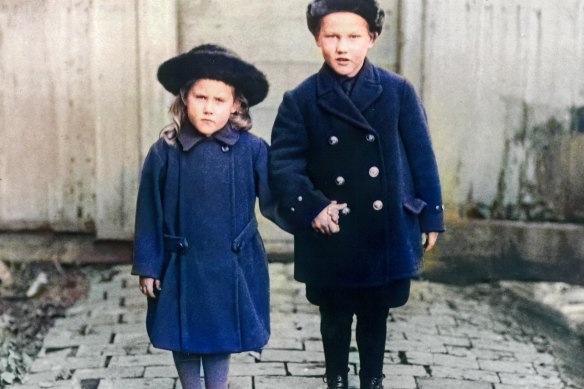 Cathy with her brother in the Netherlands in the 1920s.