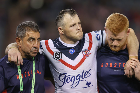 Brett Morris hobbles off the field during a game against the Knights last month.