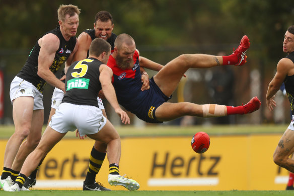 Max Gawn goes horizontal.