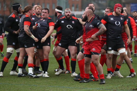The England and Georgia packs go head to head during a scrum session during the England training session held at Latymer Upper School in 2018.