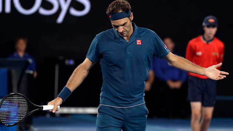 A dejected Roger Federer is out of the Australian Open.