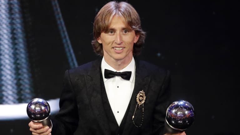 Standout: Croatia's Luka Modric receives the Best FIFA Men's Player award during the ceremony in London.