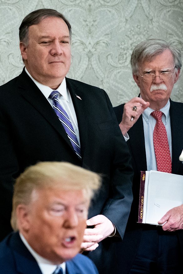 Secretary of State Mike Pompeo, left, and John R. Bolton, the national security adviser, had differing views on the peace plan.