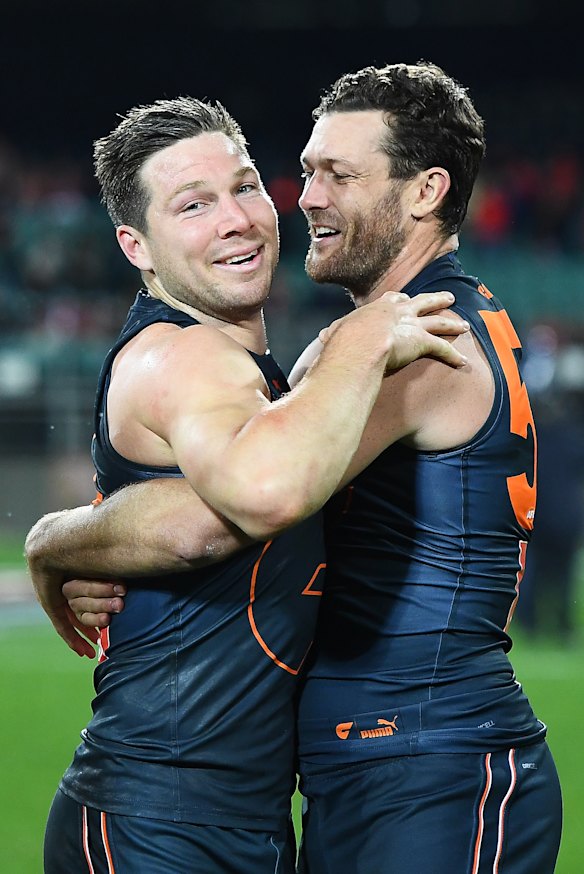 Toby Greene with Sam Reid.