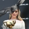 Send in the crowns. Lady Kitty Spencer returns to the Melbourne Cup