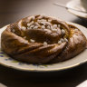 A cinnamon-and-cardamom bun with pearl sugar.