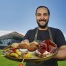 Chef Tom Sarafian with a platter of the Middle Eastern food he’l showcase at the Australian Open 2024.