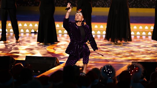 Mitch Tambo performs at Vision Australia’s Carols by Candlelight