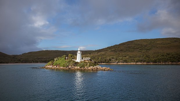 Bonnet Island, which lies at the entrance to Macquarie Harbour in western Tasmania.