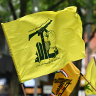 Police investigating 14 people over displays of terrorist symbols