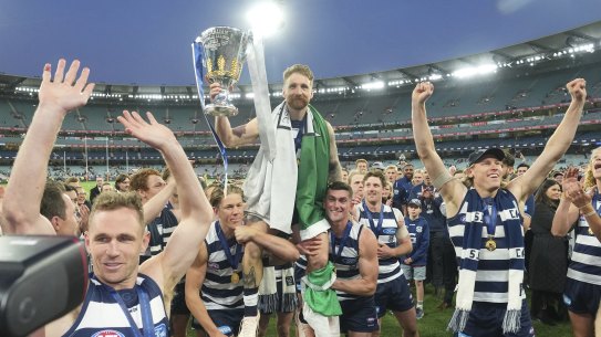 Zach Tuohy was carried from the ground draped in the Irish flag after winning a premiership in his 250th game