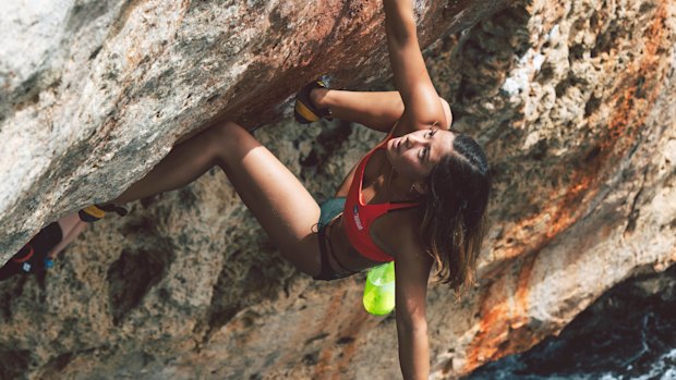 Australian climber Angie Scarth-Johnson doing deep water soloing.