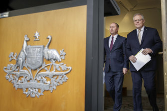 Treasurer Josh Frydenberg and Prime Minister Scott Morrison face the media as the health crisis was becoming an economic one.