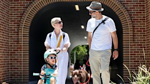 Alexandra and Wesley Nel walk along the completed Greenway with their son and dog on Sunday.