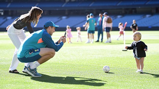 Pat Cummins with wife Becky and son Albie at the MCG on Christmas Day.