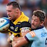 SYDNEY, AUSTRALIA - MARCH 06: Jake Gordon of the Waratahs tackles during the round four Super Rugby match between NSW Waratahs and Hurricanes at Allianz Stadium, on March 06, 2026, in Sydney, Australia. (Photo by Jeremy Ng/Getty Images)