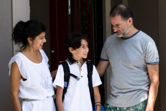 Oscar Avedissian is preparing for his first day of high school, at home with his parents. 