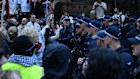 Police line at Sydney Town Hall protest against Isaac Herzog