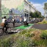 An artists render of the protected bike lane on Inkerman Street. 