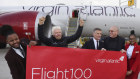 Virgin Atlantic founder Sir Richard Branson celebrates the arrival of Flight 100.