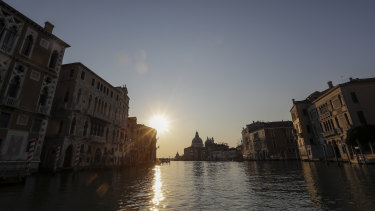 A deserted Gran Canal in Venice in early April. The waters of the city are now clear, as boats no longer churn up the mud.