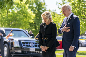 US President Joe Biden and first lady Jill Biden pay their respects to the victims of Saturday’s shooting at a memorial across the street from the TOPS Market in Buffalo, NY.