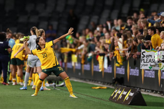 Sam Kerr throws her boots into the crowd after the Matildas faced Brazil last month. She’ll be back in Sydney next week for their friendly series against the USA.