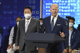 US President Joe Biden (right) speaks with South Korean President Yoon Suk-youl after a visit to the Samsung Electronic Pyeongtaek Campus in Pyeongtaek.