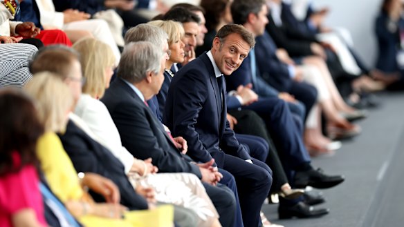 French President Emmanuel Macron enjoying the Paris Olympics ceremony.