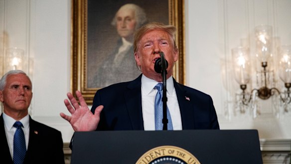 Donald Trump, accompanied by Mike Pence, condemned the weekend mass shootings in the US.