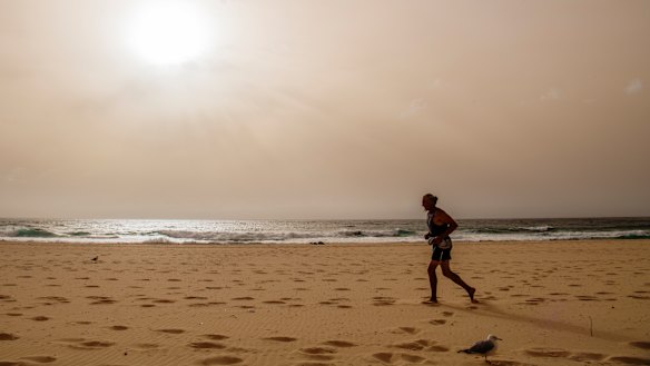 Dust clouds the sky over Maroubra on Wednesday.