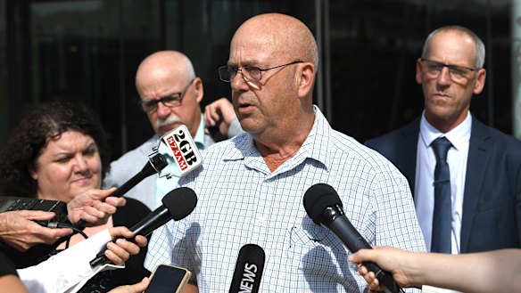 John Folbigg, brother of Craig Folbigg, reads a statement outside the NSW Coroner's Court.