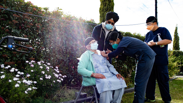 Mohinder Kaur  gets her vaccination at the Sikh temple, Gurdwara Sahib, in Glenwood.