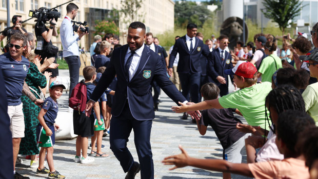 Wallabies centre Samu Kerevi greets fans at this week’s Rugby World Cup welcome ceremony in Saint-Etienne.