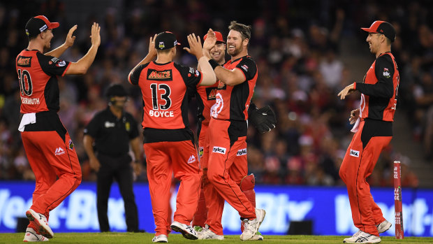 Daniel Christian of the Renegades, second from right, reacts after dismissing Michael Klinger of the Scorchers.