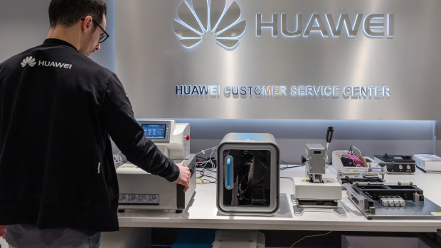 An employee works in the Huawei customer service centre in Brussels, Belgium.