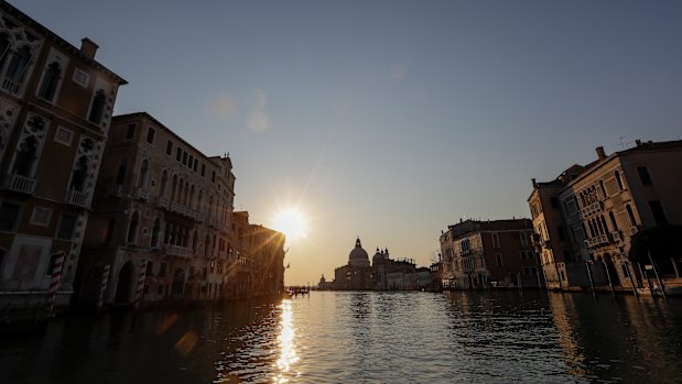 A deserted Gran Canal in Venice in early April. The waters of the city are now clear, as boats no longer churn up the mud.