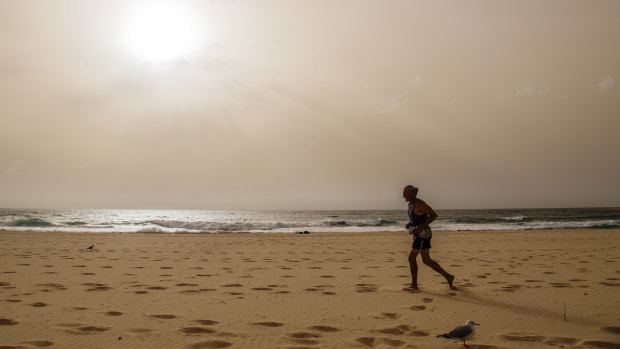 Dust clouds the sky over Maroubra on Wednesday.